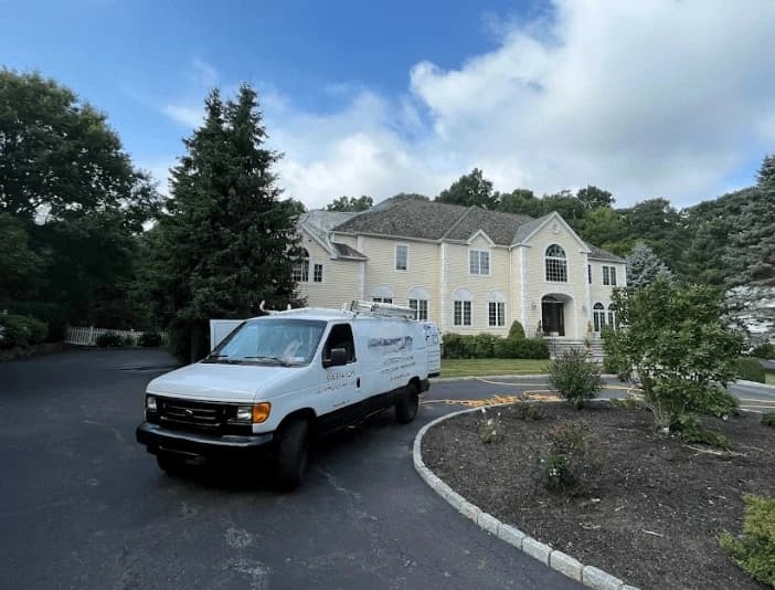 South Euclid Power Washing technician performing thorough gutter cleaning service in South Euclid