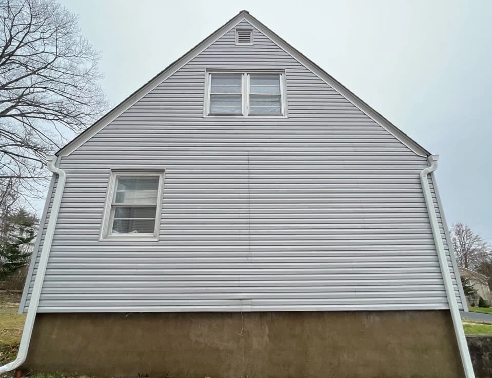 South Euclid Power Washing technician performing detailed house washing in South Euclid residential area