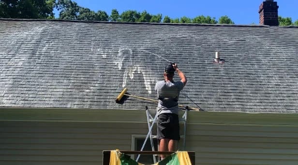 Before and after results of roof washing by South Euclid Power Washing in South Euclid